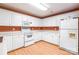 Well-maintained kitchen with white cabinetry, laminate countertops, and standard appliances at 2363 Sanderling Dr, Rock Hill, SC 29732
