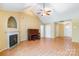 Inviting living room featuring wood floors, vaulted ceilings, and a cozy fireplace at 2363 Sanderling Dr, Rock Hill, SC 29732