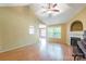 Spacious living room with wood flooring, fireplace, and large windows for natural light at 2363 Sanderling Dr, Rock Hill, SC 29732