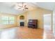 Bright living room with vaulted ceilings, fireplace, wood floors, and ample natural light at 2363 Sanderling Dr, Rock Hill, SC 29732