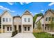 Charming new construction home with modern farmhouse-style, inviting curb appeal, and concrete driveway at 2413 Pruitt St, Charlotte, NC 28208