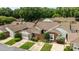 Beautiful brick home with mature trees, a single car garage, and well-manicured landscaping at 2419 Quail Lake Dr, Charlotte, NC 28210