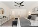 Comfortable bedroom features neutral decor, ceiling fan, and an abundance of natural light at 2448 Sweet Birch Ct, Gastonia, NC 28054