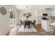 Cozy dining area with sliding glass door to patio adjacent to kitchen and breakfast bar at 2448 Sweet Birch Ct, Gastonia, NC 28054