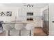 Well-lit modern kitchen featuring granite counters, stainless appliances, and a breakfast bar at 2448 Sweet Birch Ct, Gastonia, NC 28054