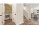 Laundry area featuring a washer, dryer, and access to the stairway at 2448 Sweet Birch Ct, Gastonia, NC 28054