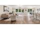 Bright living area showcases hardwood floors, modern lighting, and an open floor plan at 2448 Sweet Birch Ct, Gastonia, NC 28054