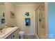 Clean bathroom with a glass-enclosed shower, modern fixtures, and stylish decor, offering a refreshing and functional space at 2449 Leonhardt Rd, Cherryville, NC 28021