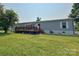 Inviting single-story home with a spacious deck, perfect for outdoor relaxation and entertaining in a serene setting at 2449 Leonhardt Rd, Cherryville, NC 28021