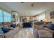 Open-concept living room showcasing the kitchen, creating a seamless flow perfect for entertaining and modern living at 2449 Leonhardt Rd, Cherryville, NC 28021