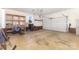 Spacious garage with ample storage, an automatic door, and plenty of room for vehicles and tools at 2627 Willis Dr, Harrisburg, NC 28075