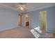 Spacious Primary bedroom featuring carpeting and ensuite bathroom at 2712 Thornburg Ct, Monroe, NC 28110