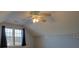 Bedroom featuring a vaulted ceiling, ceiling fan, neutral paint, and natural light from the window at 2712 Thornburg Ct, Monroe, NC 28110