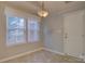 Eat in dining area featuring neutral walls and floors with natural light from the large window at 2712 Thornburg Ct, Monroe, NC 28110