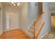 Welcoming foyer with hardwood floors and a staircase leading to the upper level at 2712 Thornburg Ct, Monroe, NC 28110