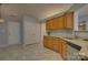 Traditional kitchen features wood cabinets, granite countertops and stainless steel dishwasher at 2712 Thornburg Ct, Monroe, NC 28110