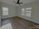 A cozy bedroom with a ceiling fan and nice natural light at 3000 Paul Payne Store Rd, Taylorsville, NC 28681