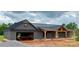 New construction home features board and batten siding and a covered front porch at 3000 Paul Payne Store Rd, Taylorsville, NC 28681