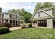 Beautiful backyard with a large patio area and a basketball court in a two car garage at 3237 Sunset Dr, Charlotte, NC 28209