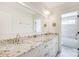 Spacious bathroom with double vanity, granite countertop and plenty of storage space at 3237 Sunset Dr, Charlotte, NC 28209