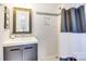 Bathroom features a shower, updated fixtures, and neutral decor at 3237 Sunset Dr, Charlotte, NC 28209