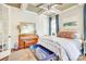 Bright bedroom featuring a piano, natural light, ceiling fan, and stylish decor at 3237 Sunset Dr, Charlotte, NC 28209