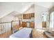 Bonus area features a bar with cabinets, a mini-fridge, and seating for entertaining at 3237 Sunset Dr, Charlotte, NC 28209