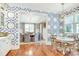 Elegant dining area showcases patterned walls and transitional decor, creating a sophisticated ambiance at 3237 Sunset Dr, Charlotte, NC 28209
