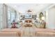 Inviting living room featuring neutral furniture, a fireplace, and custom built-in shelving at 3237 Sunset Dr, Charlotte, NC 28209