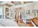 Bright main bedroom with french doors, built-in shelving, and elegant furnishings creating a cozy atmosphere at 3237 Sunset Dr, Charlotte, NC 28209