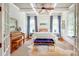 Serene main bedroom with coffered ceilings, natural light, and stylish decor, creating a relaxing retreat at 3237 Sunset Dr, Charlotte, NC 28209