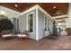 Inviting outdoor porch featuring comfortable seating and views of the surrounding landscape at 3237 Sunset Dr, Charlotte, NC 28209