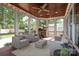 Inviting sunroom featuring woven furniture and large windows, perfect for relaxing with natural light at 3237 Sunset Dr, Charlotte, NC 28209