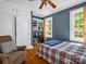 Bedroom features hardwood floors, built-in shelves and two windows at 329 E Congress St, Lincolnton, NC 28092