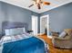 Bedroom featuring hardwood floors, neutral colored walls and two entry ways at 329 E Congress St, Lincolnton, NC 28092
