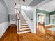 Grand foyer with hardwood floors and staircase at 329 E Congress St, Lincolnton, NC 28092