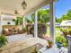 Inviting front porch with comfortable seating and stylish rug, perfect for enjoying the neighborhood views at 329 E Congress St, Lincolnton, NC 28092