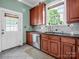 Well-lit kitchen with wooden cabinets, stainless steel appliances, and a bright, welcoming atmosphere at 329 E Congress St, Lincolnton, NC 28092