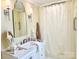 Bright bathroom features a vanity with a sleek mirror, and bathtub with shower at 3810 Biggers Rd, York, SC 29745