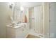 Bathroom featuring a vanity with a marble countertop and a shower with a white curtain at 3810 Biggers Rd, York, SC 29745