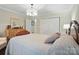 Main bedroom featuring a wooden bed frame, hardwood floors, and closet at 3810 Biggers Rd, York, SC 29745