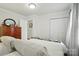 Bedroom with wood floors, white walls, and closet at 3810 Biggers Rd, York, SC 29745
