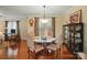 Charming dining room with hardwood floors, elegant lighting, and seating for four provides a cozy dining space at 3810 Biggers Rd, York, SC 29745