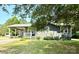 Exterior of the home showing the covered carport, small porch, and partial lawn at 3810 Biggers Rd, York, SC 29745