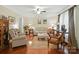 The living room features hardwood floors and neutral decor, offering a warm and inviting atmosphere at 3810 Biggers Rd, York, SC 29745