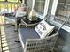 Inviting porch with cozy seating, decorative pillows, and a charming birdhouse at 3810 Biggers Rd, York, SC 29745