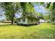 Green house with siding with a large backyard at 39 Selma Dr, Mooresville, NC 28115