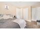 Bedroom featuring neutral walls, carpet flooring, comfy bed, nightstand and two doors at 39 Selma Dr, Mooresville, NC 28115