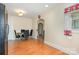 Open floorplan features a round dining table with ornate legs, wood flooring, and neutral colored walls at 39 Selma Dr, Mooresville, NC 28115