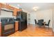 Well-lit kitchen boasts updated appliances, ample counter space, and leads into the dining area at 39 Selma Dr, Mooresville, NC 28115